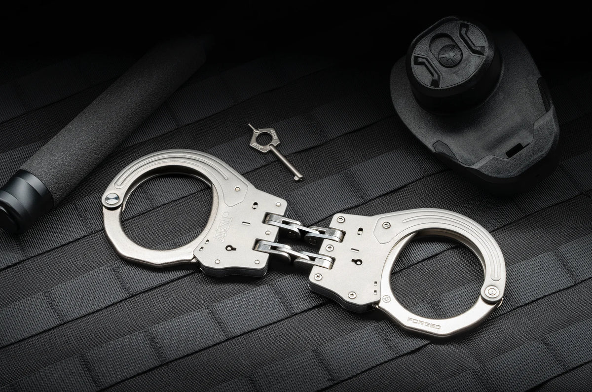 ASP - Handschelle Sentry mit Gelenk aus Stahl